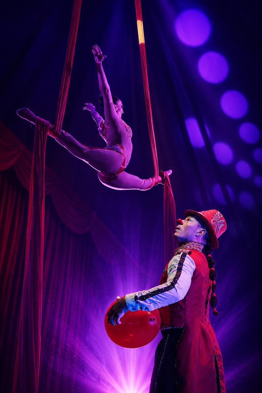 Circus fire entertainer lighting up the night under the big top